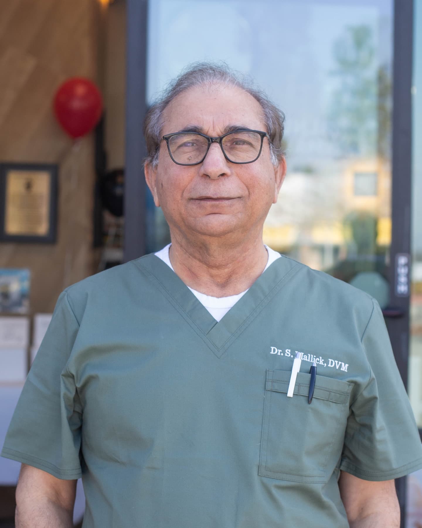 Dr. Mallick, Lead Veterinarian at Walnut Valley Animal Hospital